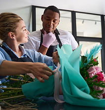 man-watches-a-woman-collect-a-flower-bouquet-opt.jpg