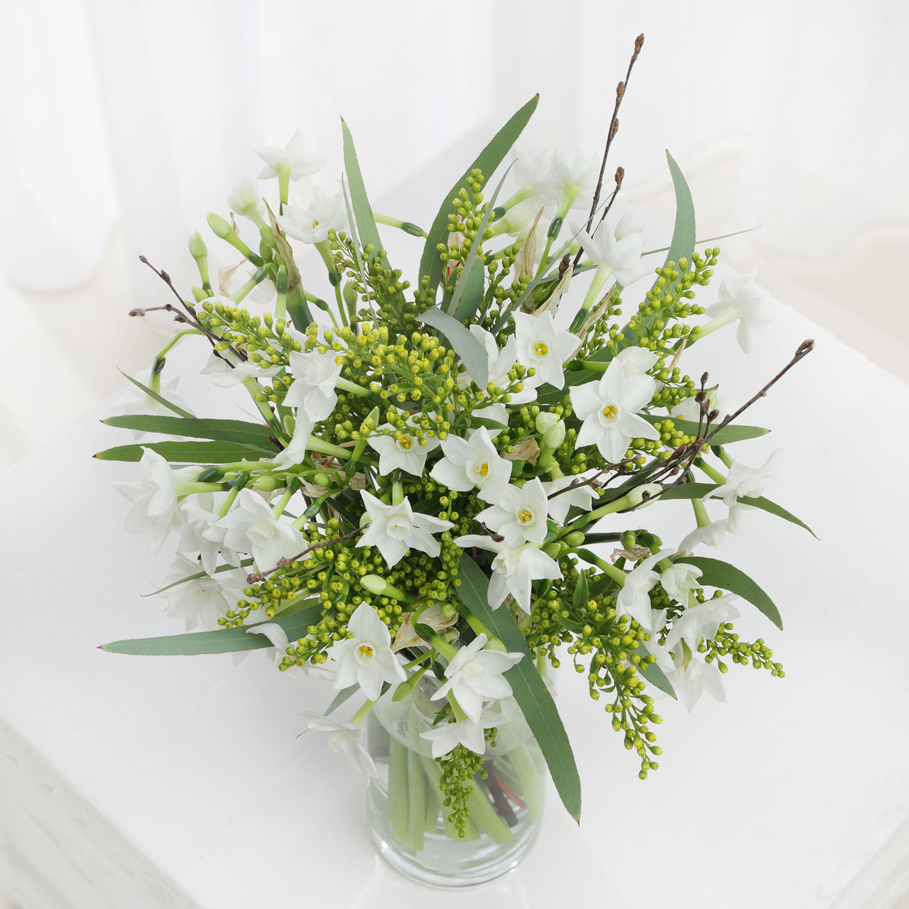 winter style arrangement made with February Flowers Narcissi