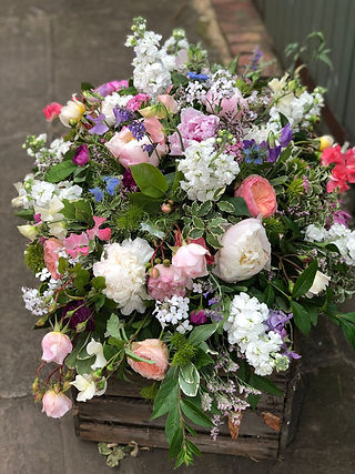 oval casket spray