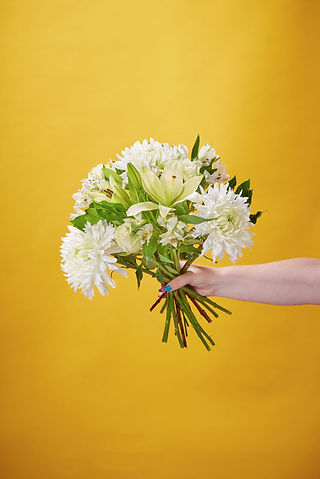 Decemeber Flowers hand-tied with lilies and chrysanthemums