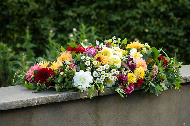 casket spray with dahlias